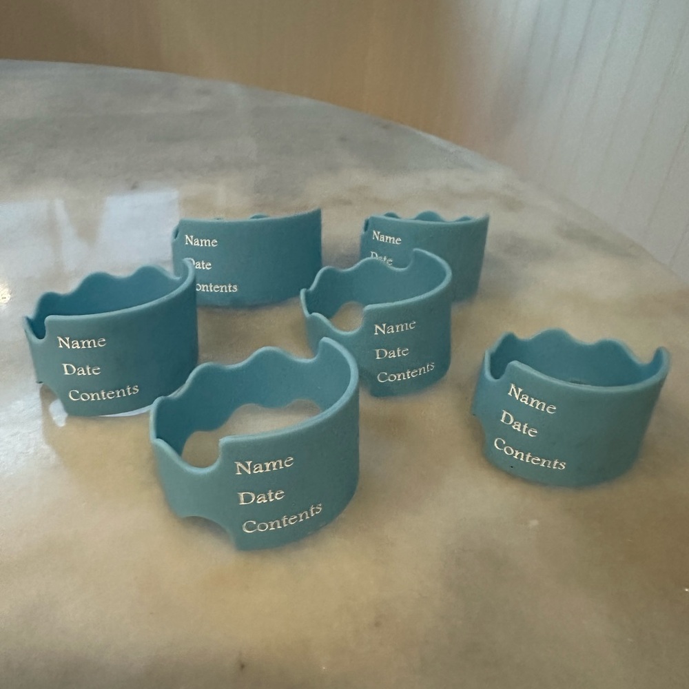 Blue reusable silicone bottle labels